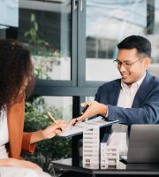 A man giving legal advice to a borrower
